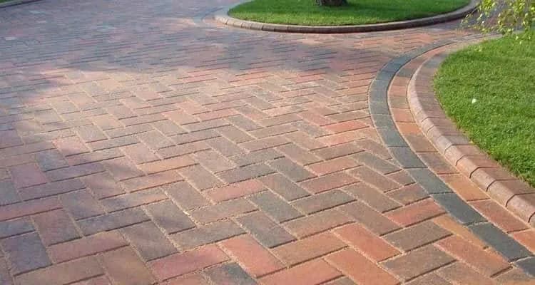 Herringbone block paving driveway with a curved contrast border, completed in Leeds by CLM Projects