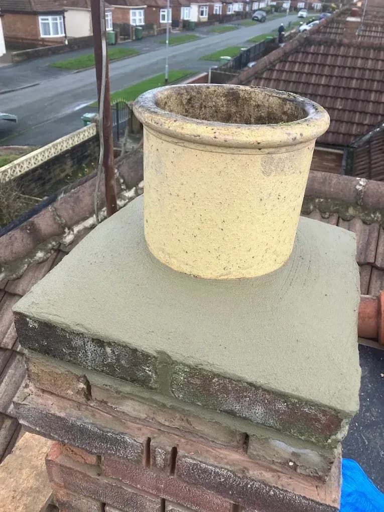 Chimney stack repointed with new flaunching