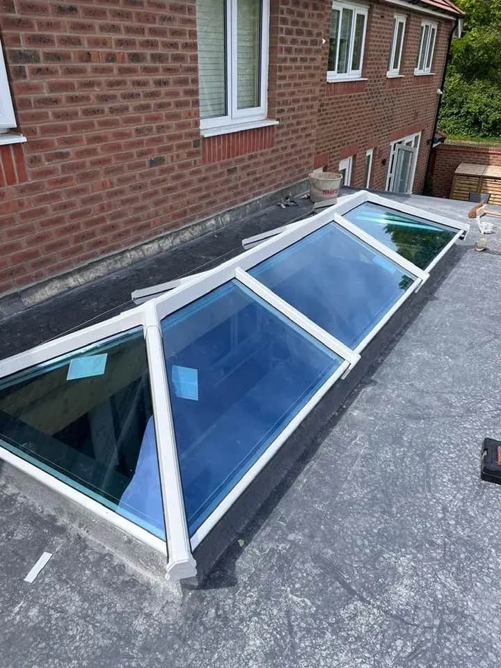 Glazed roof lantern fitted on a flat-roof extension