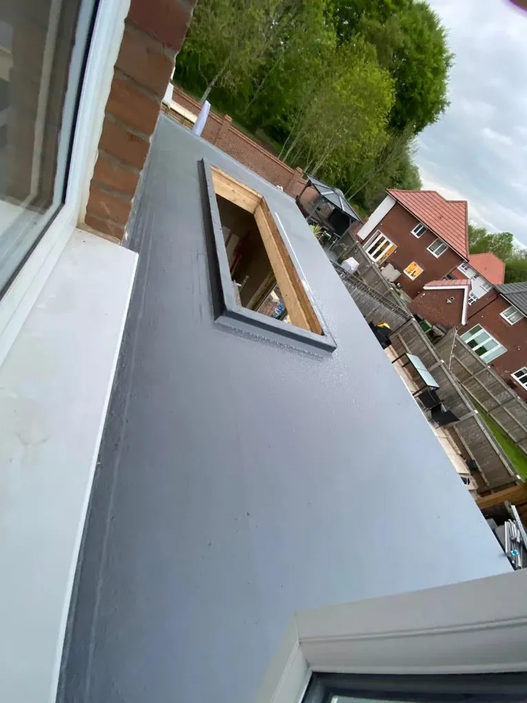 Fibreglass flat roof with skylight opening