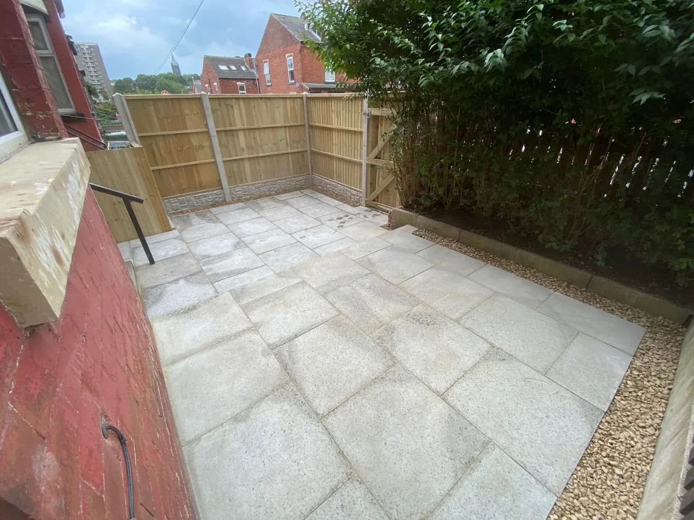 Full garden transformation with new fencing, gate and paved patio, completed in Leeds by CLM Projects