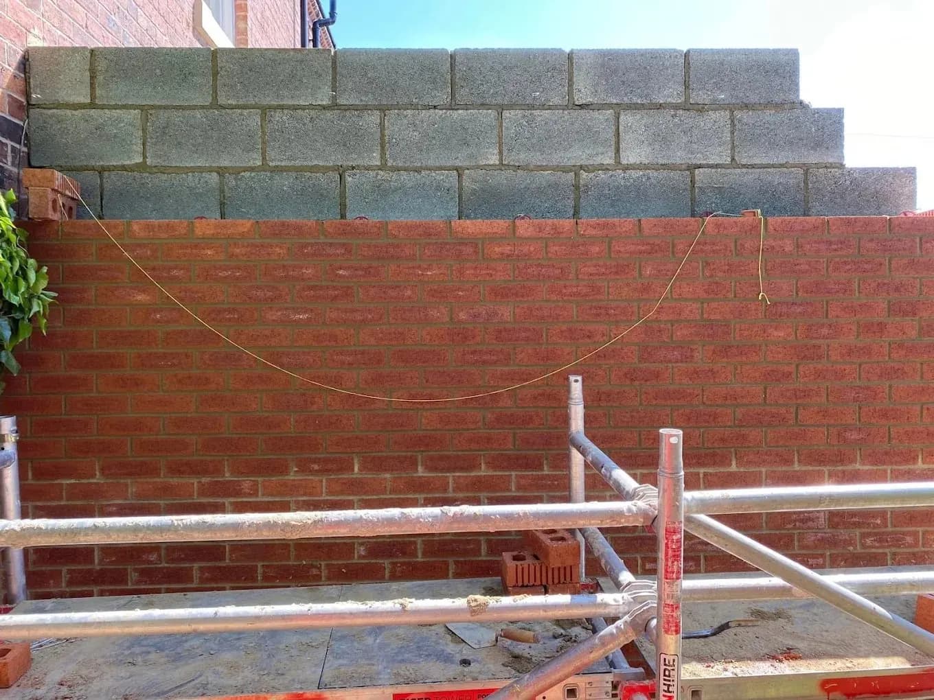 New brick and blockwork wall under construction