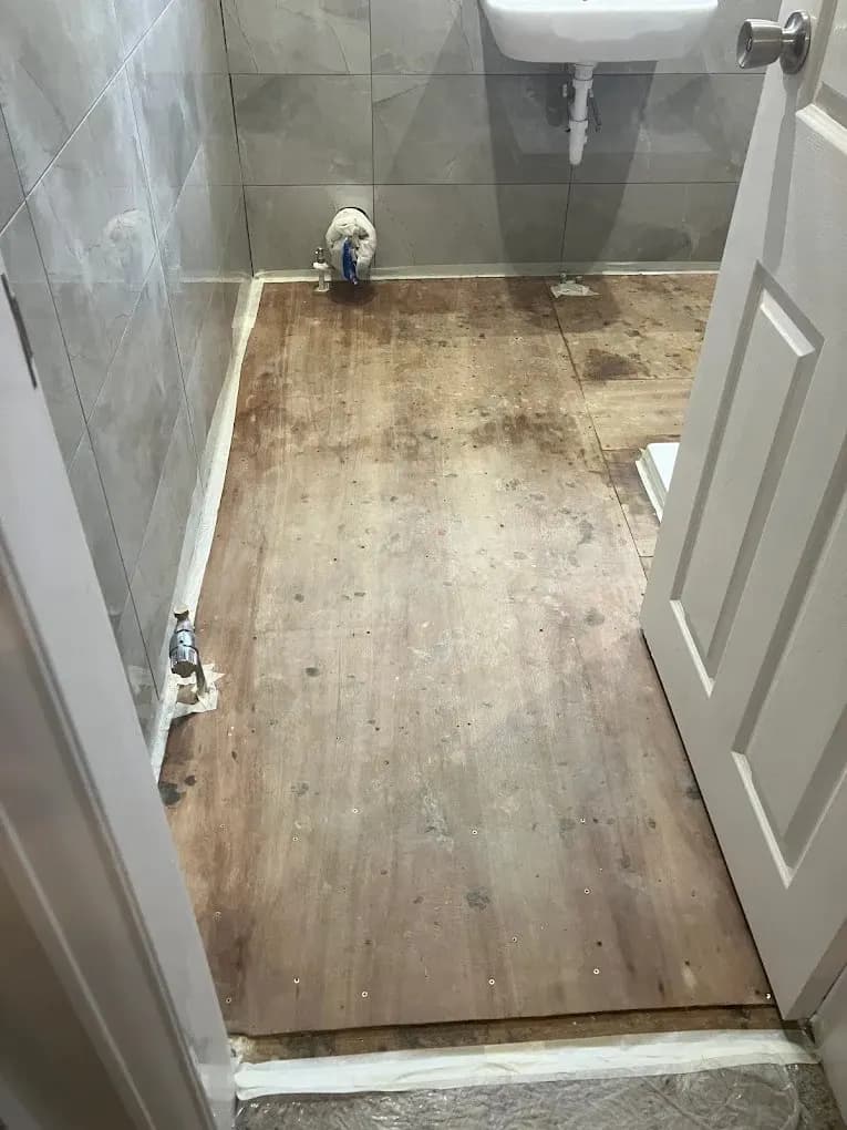 Plywood subfloor preparation before bathroom flooring