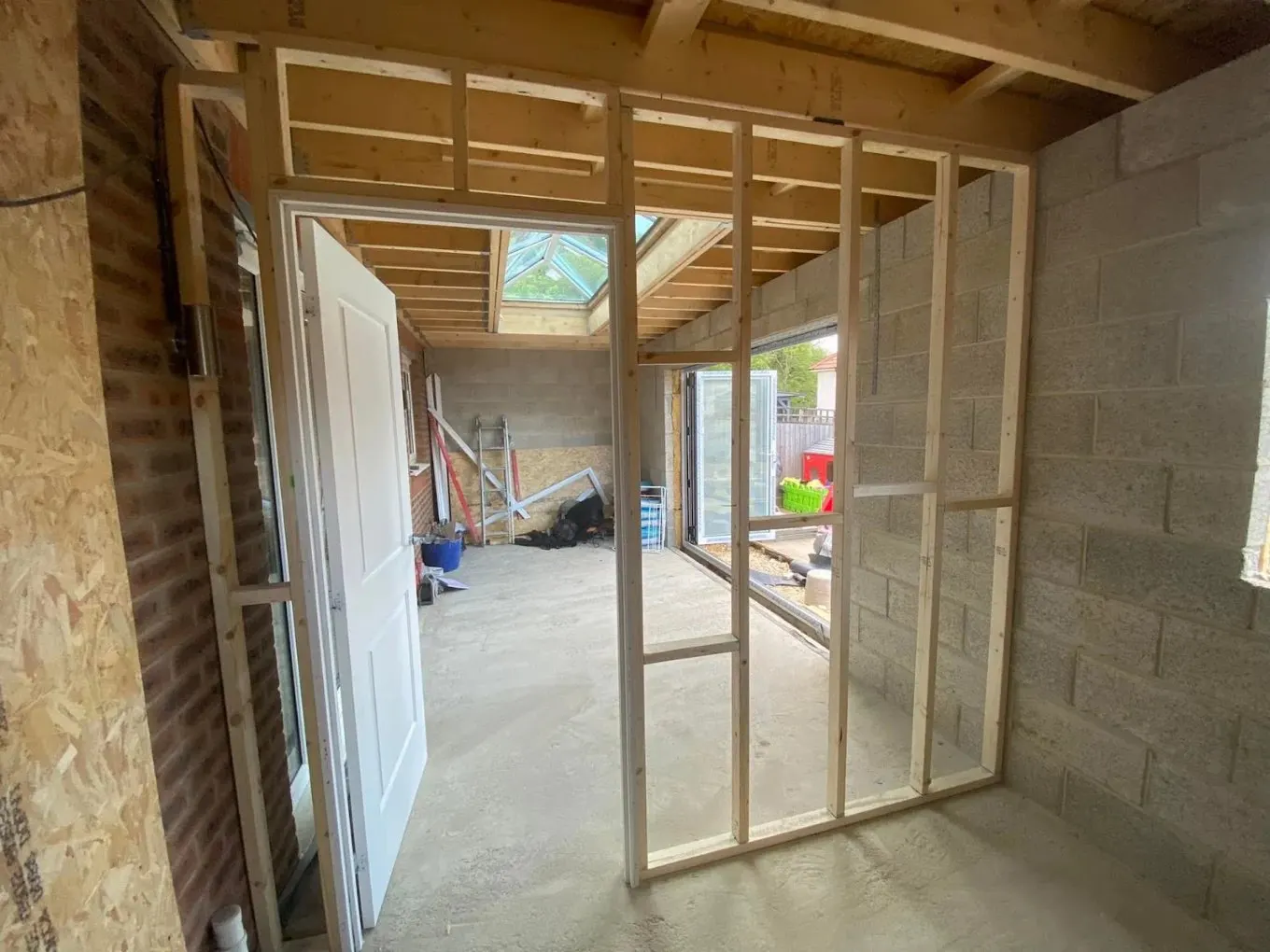 Timber stud wall framing inside an extension