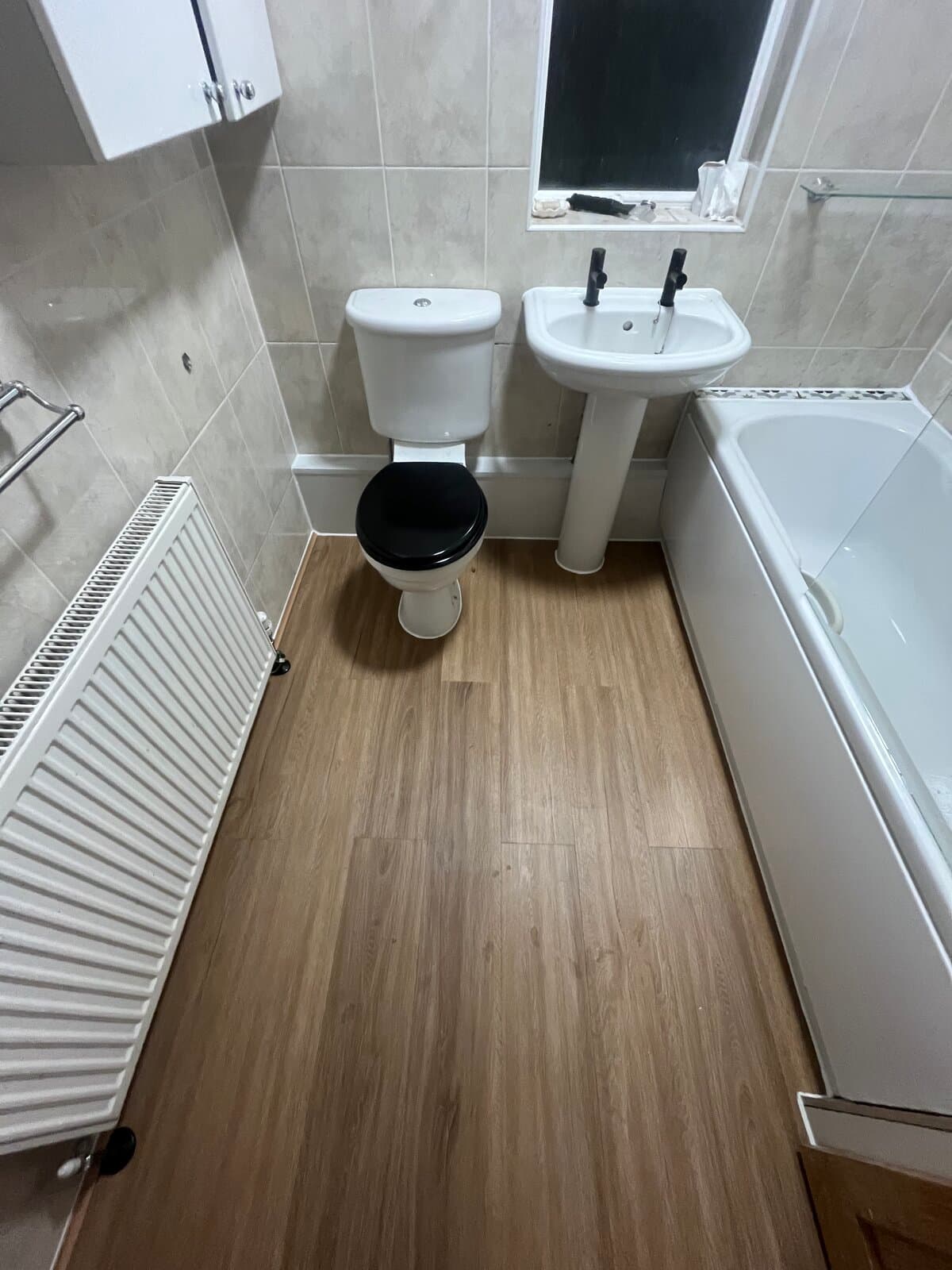 Bathroom floor rebuilt after water damage, Kirkstall — photo 11